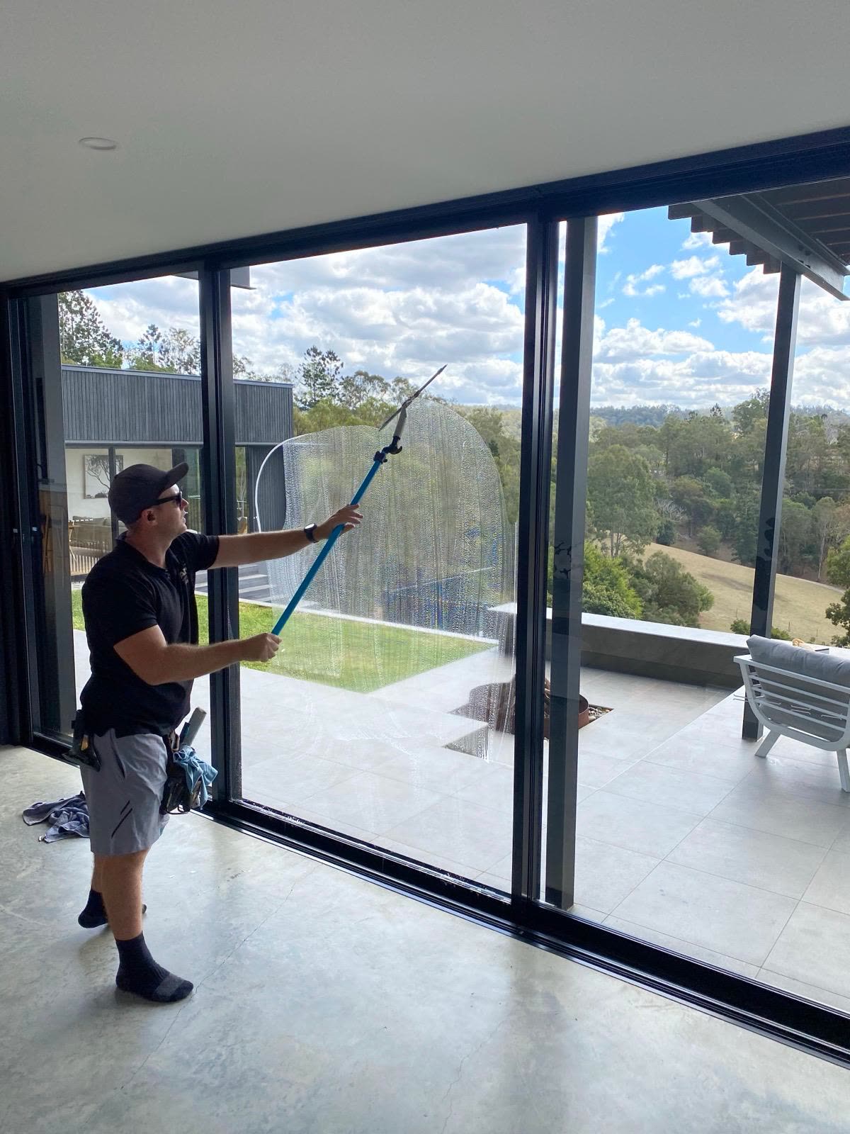 Cleaner producing streak-free glass on a modern home
